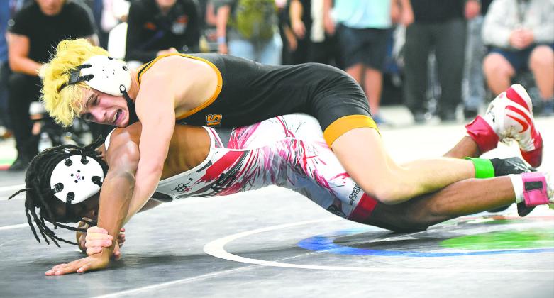 Nathan Lyttle will battle to do what only Sawyer Root has done: win multiple state wrestling championships for Harmony High. (File Photo)