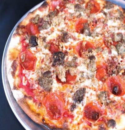 You can get savory burgers, left, at Yeoman’s Cask &amp;amp; Lion, while pizza, right, is a staple at Capone’s. PHOTOS/EXPERIENCE KISSIMMEE