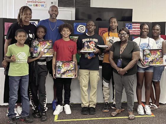 Youths were encouraged to express their inner selves through art in the WYE “Reflections: Portraits of Who I Am” program. PHOTO/DEBBIE DANIEL