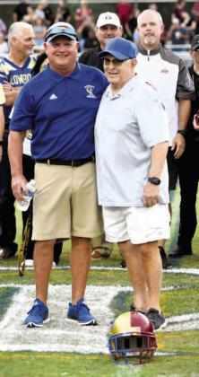 Former OHS coaches Doug Nichols (left) and Jim Scible, who led the Kowboys to their 1998 state title, participate in the pre-game ceremonies.