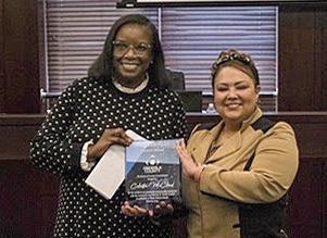 Osceola County Commissioner Viviana Janer presented Housing and Community Services Director Celestia McCloud with the 2024 Lieutenant Lloyd Burton, Jr. Service Award. PHOTO/OSCEOLA COUNTY