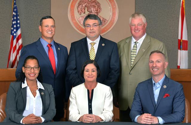 Here is the Osceola County School Board. Superintendent Debra Pace is centered in the bottom row.