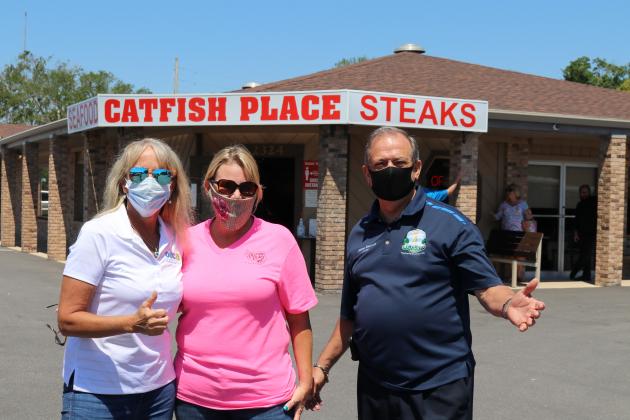 On Tuesday, May 5, Terry Torrens, OUC legislative representative, was joined by St. Cloud Mayor Nathan Blackwell to deliver lunch from The Catfish Place to Publix employees at the location on Canoe Creek Road in St. Cloud.