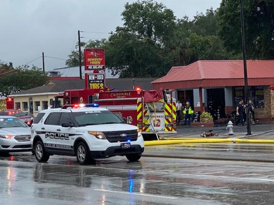 Kissimmee firefighters extinguish a fire at Speedy Tires. NEWS-GAZETTE PHOTO/BRIAN MCBRIDE
