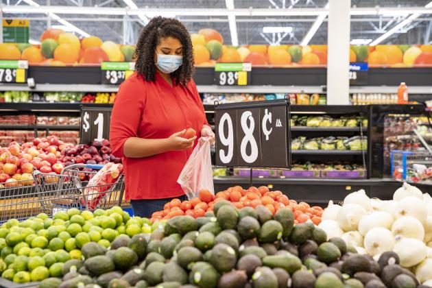 A customer wears a mask while shopping at a Walmart store. PHOTO/WALMART