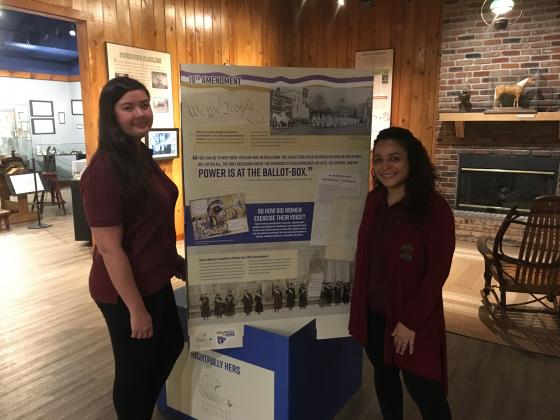 Osceola History Curator Michelle Finnegan (left) and visitor services staff member Thalia Betancourt are pictured with the new “Rightfully Hers” exhibit at the Osceola County Welcome Center &amp; History Museum. The exhibit from the National Archives commemorates the 100th anniversary of the ratification of the 19th Amendment and the generations-long fight for women’s voting rights.