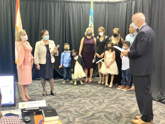 Kissimmee Commissioner Olga Castaño, far left, is sworn in. NEWS-GAZETTE PHOTO/BRIAN MCBRIDE