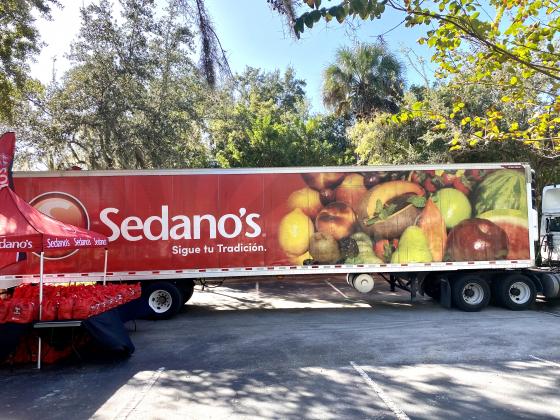 Sedano's once again partnered with the city of Kissimmee to hand out Thanksgiving meals. NEWS-GAZETTE PHOTO/BRIAN MCBRIDE
