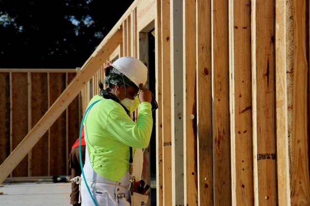Habitat homeowner at work.