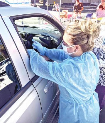 An injection of the COVID-19 vaccine is given to an individual at the Florida Department of Health – Osceola. Photo/Florida Department of Health – Osceola