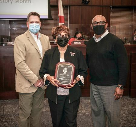 From left are Osceola County Commission Chairman Brandon Arrington, Deloris McMillion and Tiger McMillon.