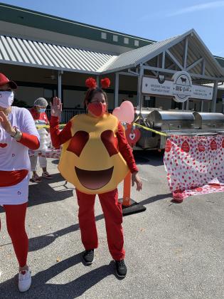 Osceola County on Aging staff cheering on Seniors. PHOTO/OSCEOLA COUNCIL ON AGING