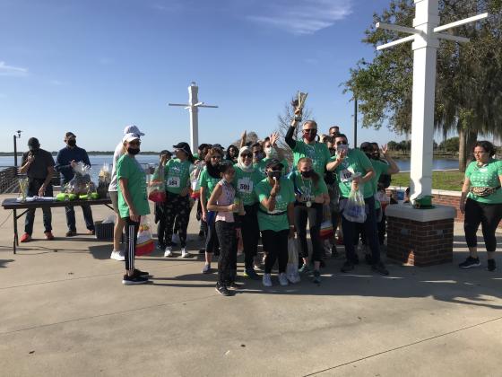 Bruce Vickers of the Osceola Tax Collector's Office wins Largest Team at the March for Meals 5K.