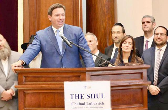 Gov. Ron DeSantis signs a bill requiring schools provide time to pray. Photo courtesy of the Florida Governor's office