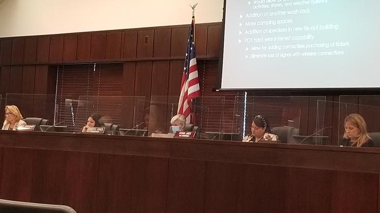 From left, Deputy County Manager Beth Knight,Commissioners Viviana Janer, Peggy Choudhry and Cheryl Grieb and Assistant County Attorney Kimberly Kopp formed the first-ever all-female dais at Monday's County Commission meeting. PHOTO/KEN JACKSON