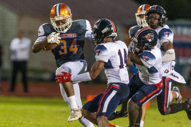 Harmony running back rushed for 153 yards in the Longhorns' 24-7 Kickoff Classic win over Freedom. PHOTO/ROB HERBERT