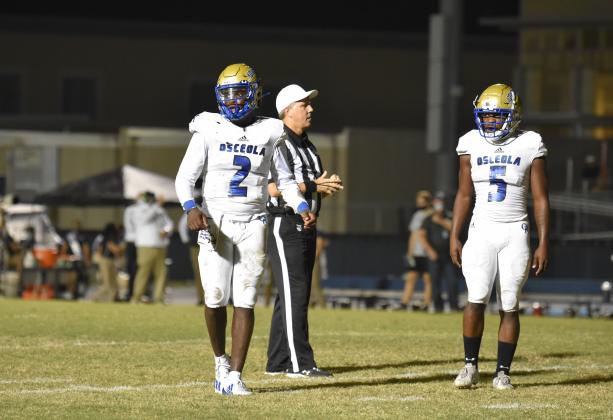 Chad Mascoe (2, 3 TD passes, 86 rushing yards) and Ja'Randy Swint (65 rushing yards) helped key OHS' 28-0 win over Lake Nona. PHOTO/JANA STULTZ