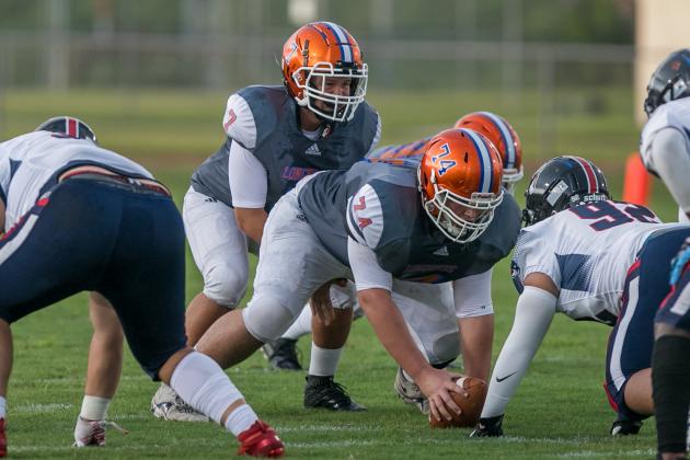 Harmony quarterback Aiden Parks, shown in the team's Kickoff Classic, accounted for two touchdowns in the Longhorns' 49-6 win over Gateway Friday. PHOTO/ROB HERBERT