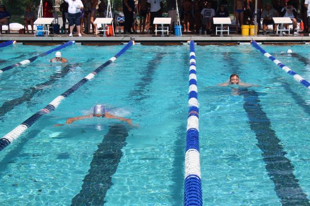 The 100 boys breaststroke gets off to a fast start at the OBC title meet Thursday. PHOTO/KEN JACKSON