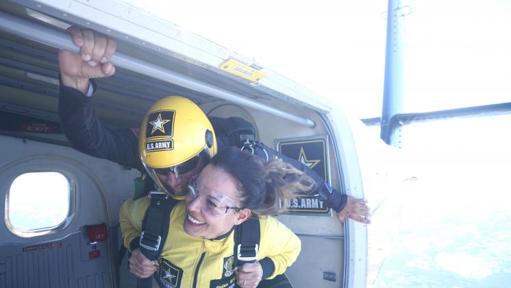 Kissimmee Economic Development Director-turned Airborne Ranger Belinda Kirkegard prepares to skydive with the U.S. Army Golden Knights last month. PHOTO/SFC James Hackett, U.S. Army