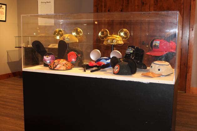 It's all about the ears at the Osceola County Historical Society's “50 Years of Theme Parks” exhibit, marking the 50-year anniversary of the opening of Walt Disney World. PHOTO/TERRY LLOYD