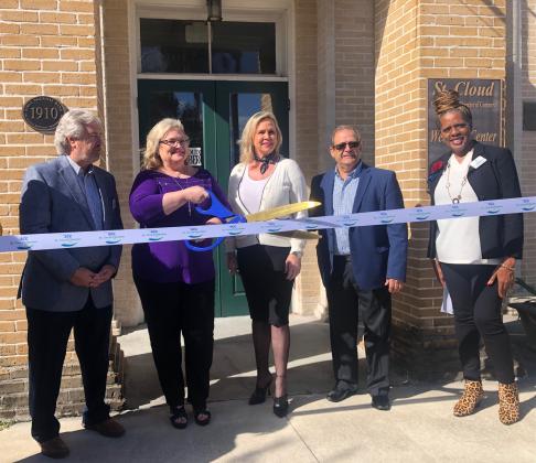 The Lifeboat Project celebrated its ribbon cutting in St. Cloud Tuesday, Human Trafficking Awareness Day. The organization empowers the lives of human trafficking survivors through long-term aftercare, residential programs, and education. From left, St. Cloud Chamber President Dirk Webb,  Jill Bolander Cohen, Founder/CEO and Sonya Hightower-Labasco, Project Coordinator of The Lifeboat Project, Mayor Nathan Blackwell and St. Cloud Chamber Membership Development Manager LaTanya Newell. PHOTO/TONI ROWAN