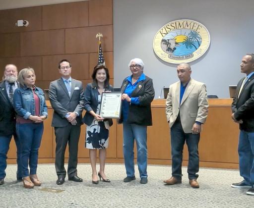 Twis Lizasuain, Chief Executive Officer for the Osceola County Association of Realtors® and Realtor® member and the City of Kissimmee’s Affordable Housing Chairman Robert Bussiere, accepted a proclamation for Fair Housing Month from Mayor Olga Gonzalez and the Kissimmee City Commission April 5. PHOTO/OSCAR
