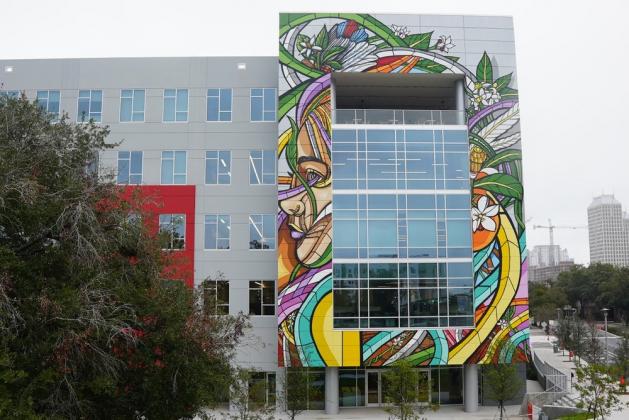 Don Rimx, who painted this mural on the downtown Orlando Creative Village campus, will begin work on an Osceola Arts ARTisNOW piece at Valencia College's Osceola campus on Monday. PHOTO/DONRIMX.COM
