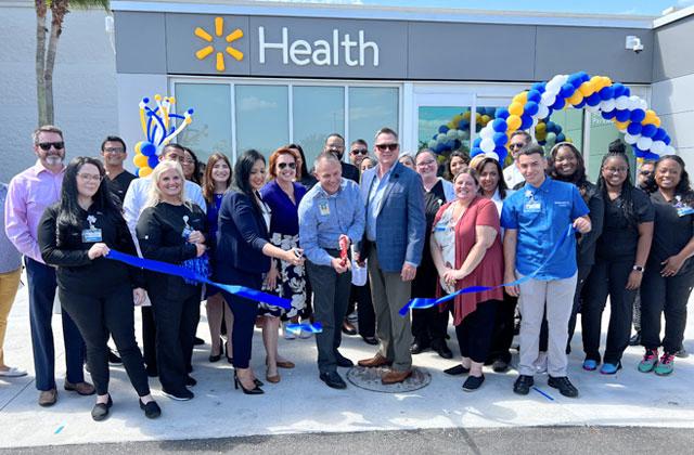 Walmart and local officials cut the ribbon on the store's new Walmart Health center at the Poinciana location. SUBMITTED PHOTO