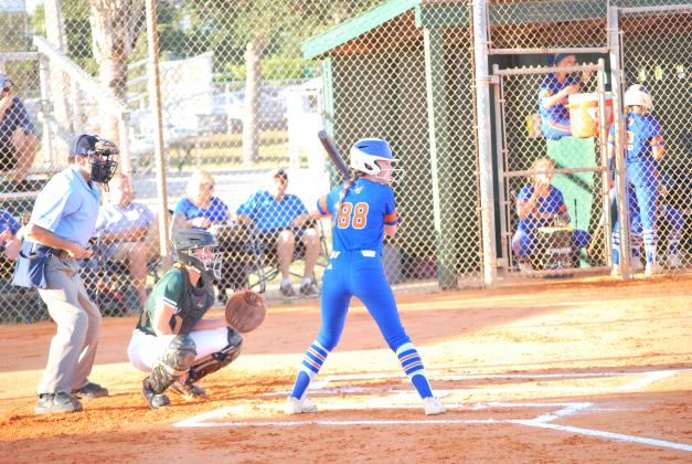 Hartmony's Ireland Sibbitt tries to start a rally at the plate in Thursday's Class 6A regional playoff game at Melbourne. PHOTO/ASHLEY CARNIFAX