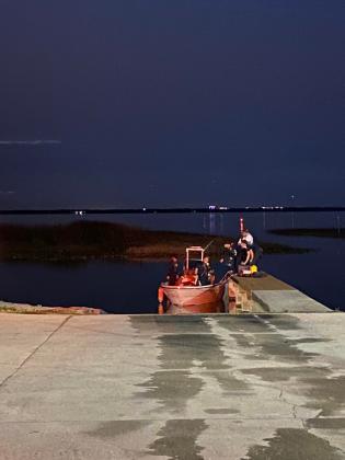 A St. Cloud Fire Rescue Department search boat looked for a missing boater on East Lake Toho Saturday night. The search picked back up Sunday morning; the body of a man from Port St. Lucie was recovered Sunday morning. PHOTO/SCFD