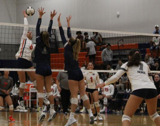 Isabel Suarez goes up for a point Wednesday against Lake Nona. PHOTO/KEN JACKSON