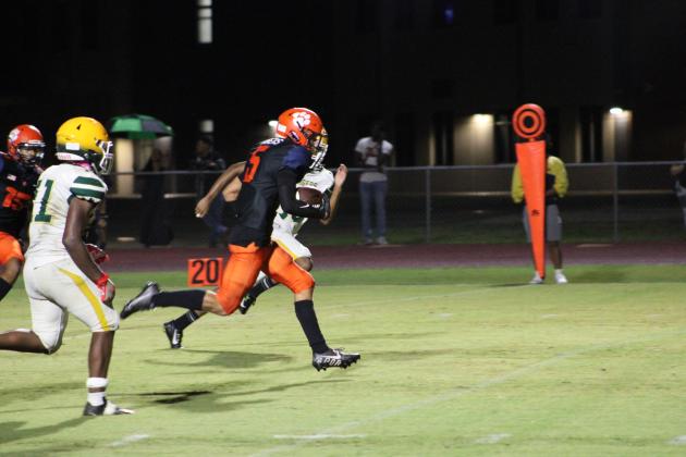 Tohopekaliga receiver Julian Nasco runs to end zone on a 25-yard touchdown pass  in Friday's 49-0 win. PHOTO/LINDSETY TELLEZ