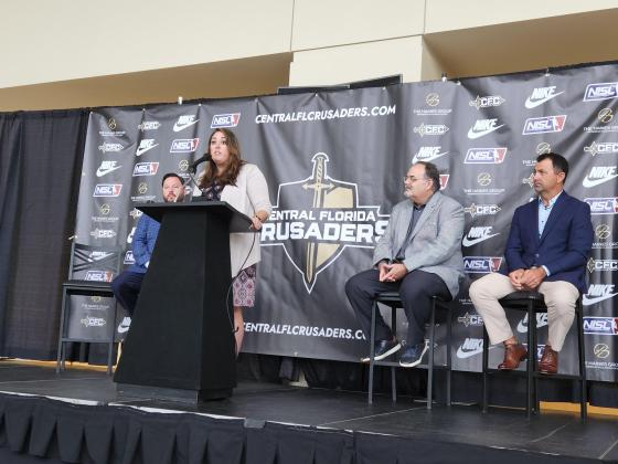 Former Orlando SeaWolves coach Tom Traxler (seated at left) coached the team at the Silver Spurs Arena, and has been named head coach of the Central Florida Crusaders. PHOTO/KEN JACKSON