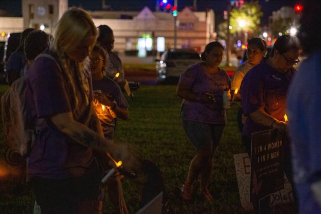 Wednesday's event concluded with a candlelight vigil at the Kissimmee Police Department. PHOTO/HELP NOW