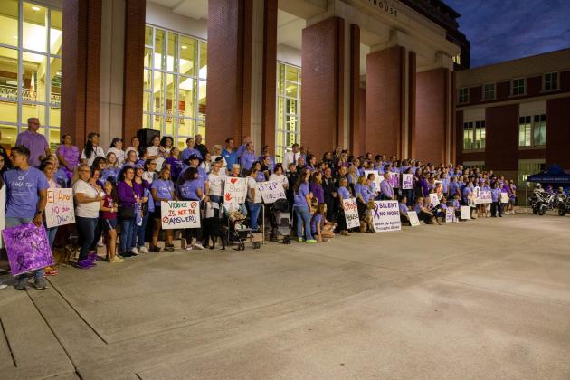 Hundreds gathering Wednesday in front to the Osceola County Courthouse in support of all the victims of domestic violence. PHOTO/HELP NOW