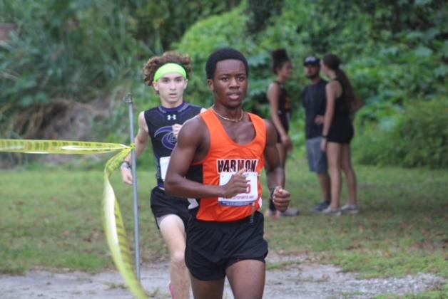 Harmony's Joel Jean sets an early pace on the way to individual victory in the OBC boys cross country race Wednesday. PHOTOS/LINDSETY TELLEZ