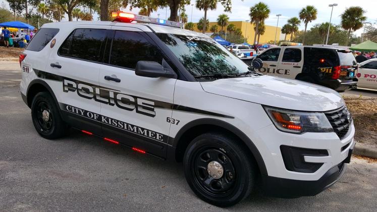 A Kissimmee Police officer turned himself in Wednesday on counts of grand theft and one count of scheme to defraud. FILE PHOTO
