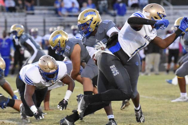 The Osceola defense, led by John Walker and Derrick LeBlanc, pictured here last week against Mainland, made life difficult for Tohopekaliga quarterback Sabby Meassick. PHOTO/JANA STULTZ