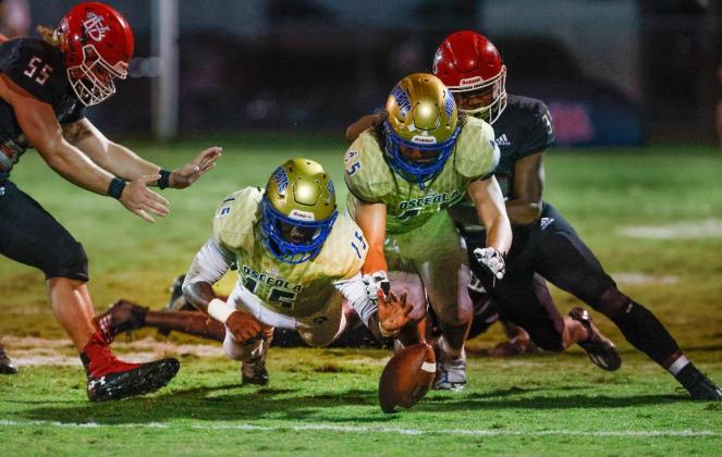 Osceola linebacker Drevon Lee (15) recovers a Vero Beach fumble for one of four turnovers the Kowboys forced Friday. PHOTO/REINHOLD MATAY