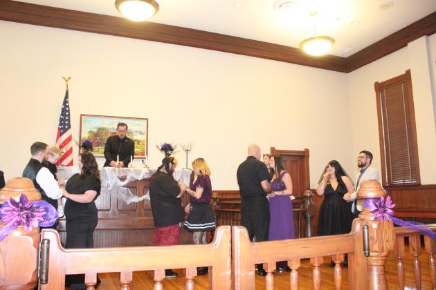 Couples showed their Halloween spirit — on their wedding day! — Monday at Osceola’s Historic Courthouse as part of the Clerk’s office inaugural “Scare-a-Mony.” PHOTO/KEN JACKSON