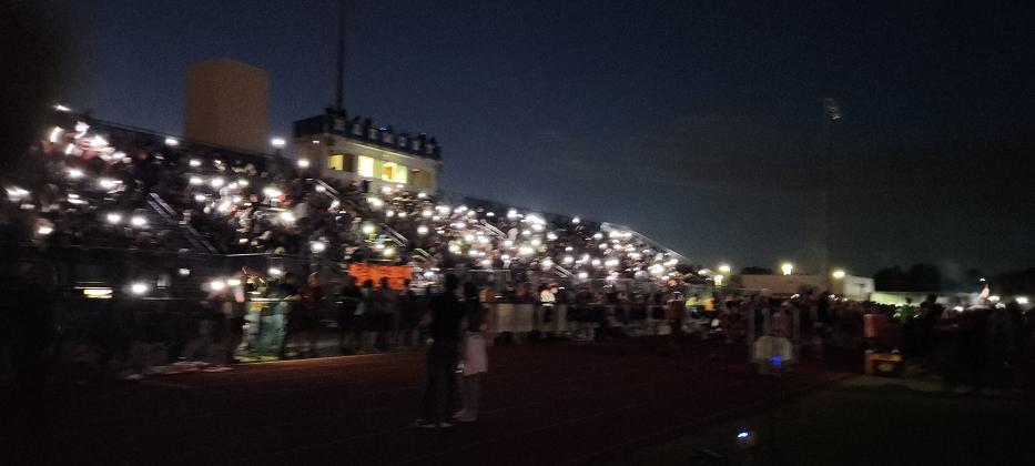 The stadium lights at Harmony High went out late in the first quarter -- the crowd just went with it. PHOTO/KEN JACKSON