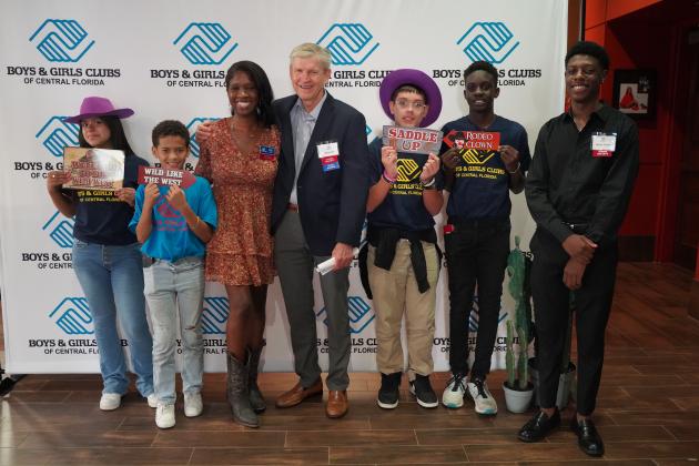 Boys &amp; Girls Club of Central Florida CEO Gary Cain "Saddled Up" with Boys &amp; Girls Club members. PHOTO/BOYS &amp; GIRLS CLUB