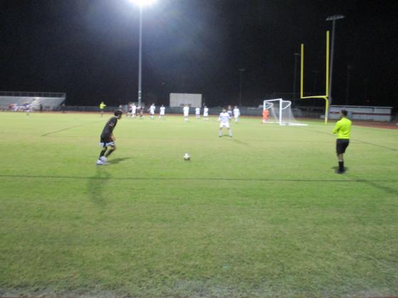 Gateway’s Luis Rivero (black jersey) gets ready to take a free kick in the first half against Harmony.  The Panthers won the game 2-0 to advance to the title contest.  PHOTO/DAN PEARSON