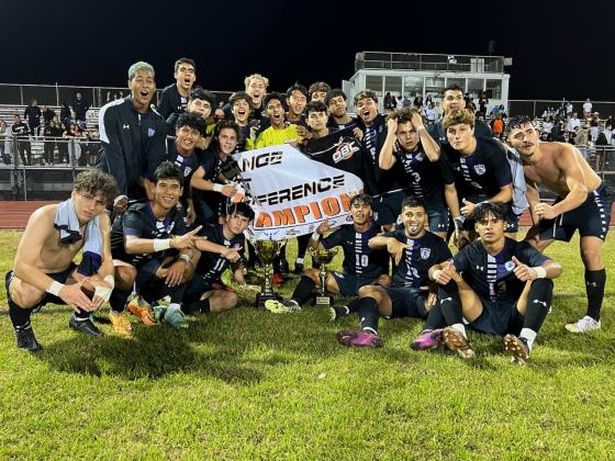 Celebration’s soccer team display the Orange Belt Conference championship trophy after downing host Gateway, 3-1, in Friday night’s final.  (Photo courtesy Chad Boudreaux/Celebration AD)