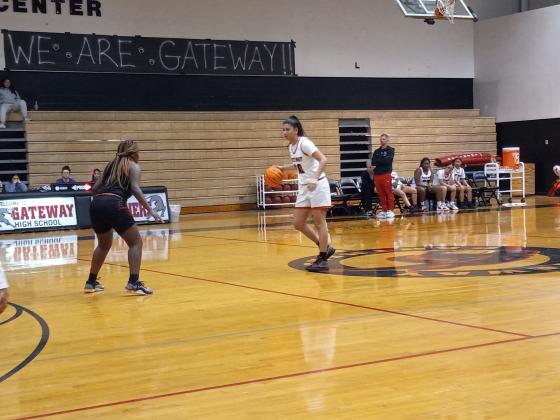 Malayna Stevenson, who led all scorers with 24 points, brings the ball up in Tuesday's 46-37 playoff win over Lake Wales. PHOTO/DAN PEARSON