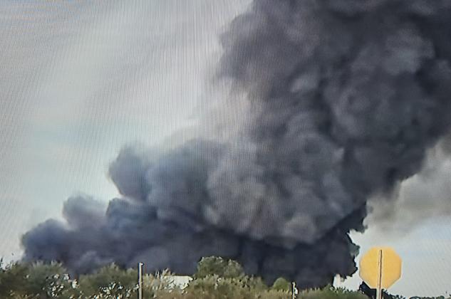 A nursery fire from overnight continues to burn south of the intersection of Poinciana Boulevard and John Young Parkway. PHOTO/WFTV