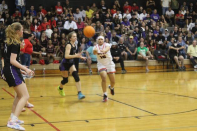 Sky Peterson passes into the corner during Gateway's 69-40 win Friday over River Ridge in the Region 5A-2 championship. PHOTO/KEN JACKSON