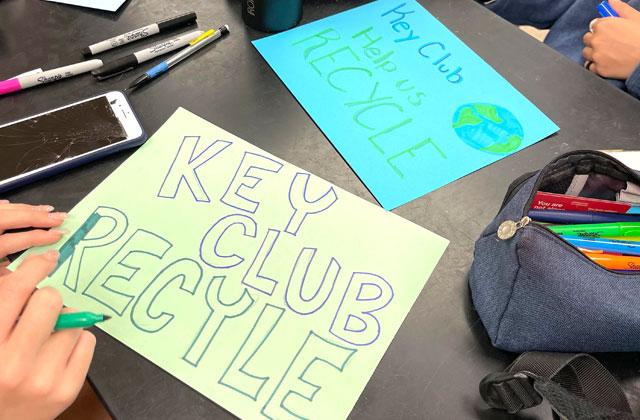 Recycling posters designed by Key Club members at Celebration High School to spread the word about recycling. PHOTO/CELEBRATION KEY CLUB