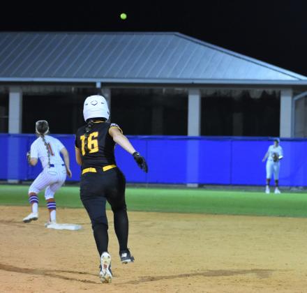 Emerson Aslan tracked a ball laced by St. Cloud's Addison Felblinger in the top of the seventh to throw out the runner at second in Friday's 8-7 Harmony win. PHOTO/KATIE WILLIAMS